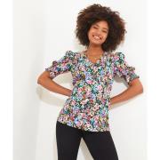 Blusa de flores con cuello de pico