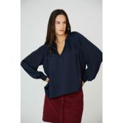 Blusa con cuello de pico